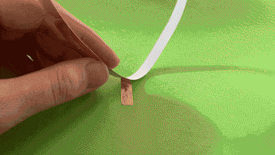 fold the tape backwards then forwards