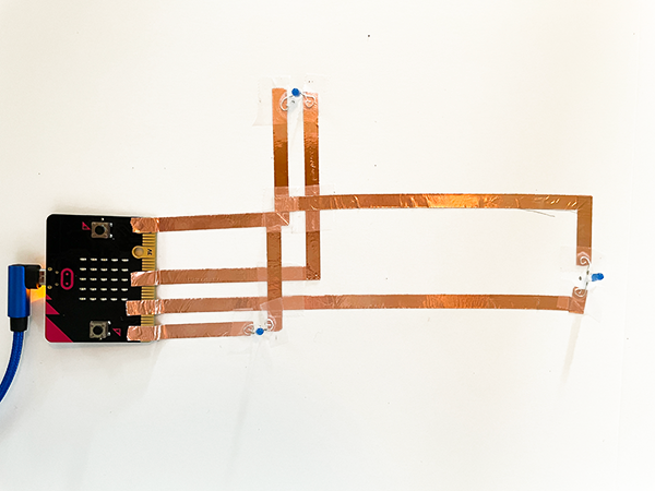 three LEDs each attached to a different pin